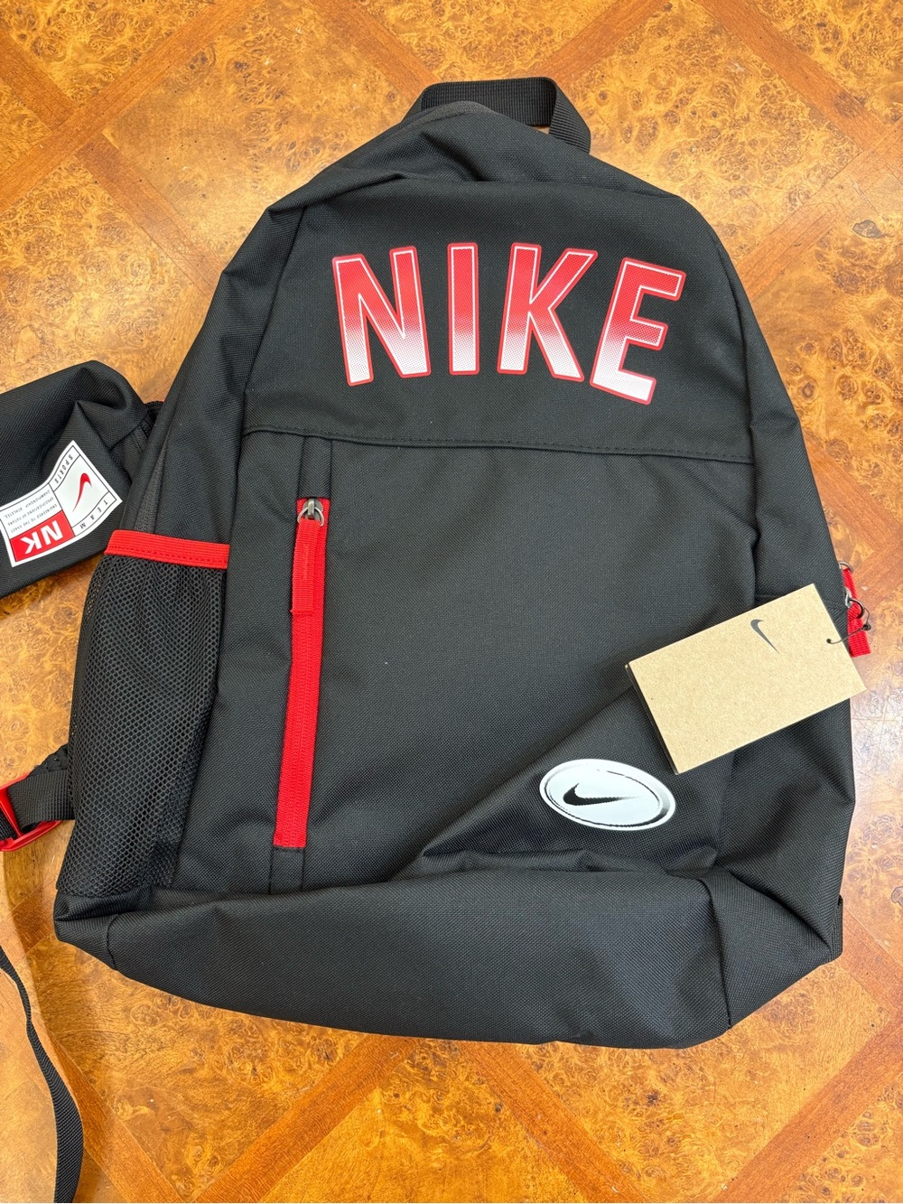 Nike Black Backpack with Red Accents and Detachable Pencil Case